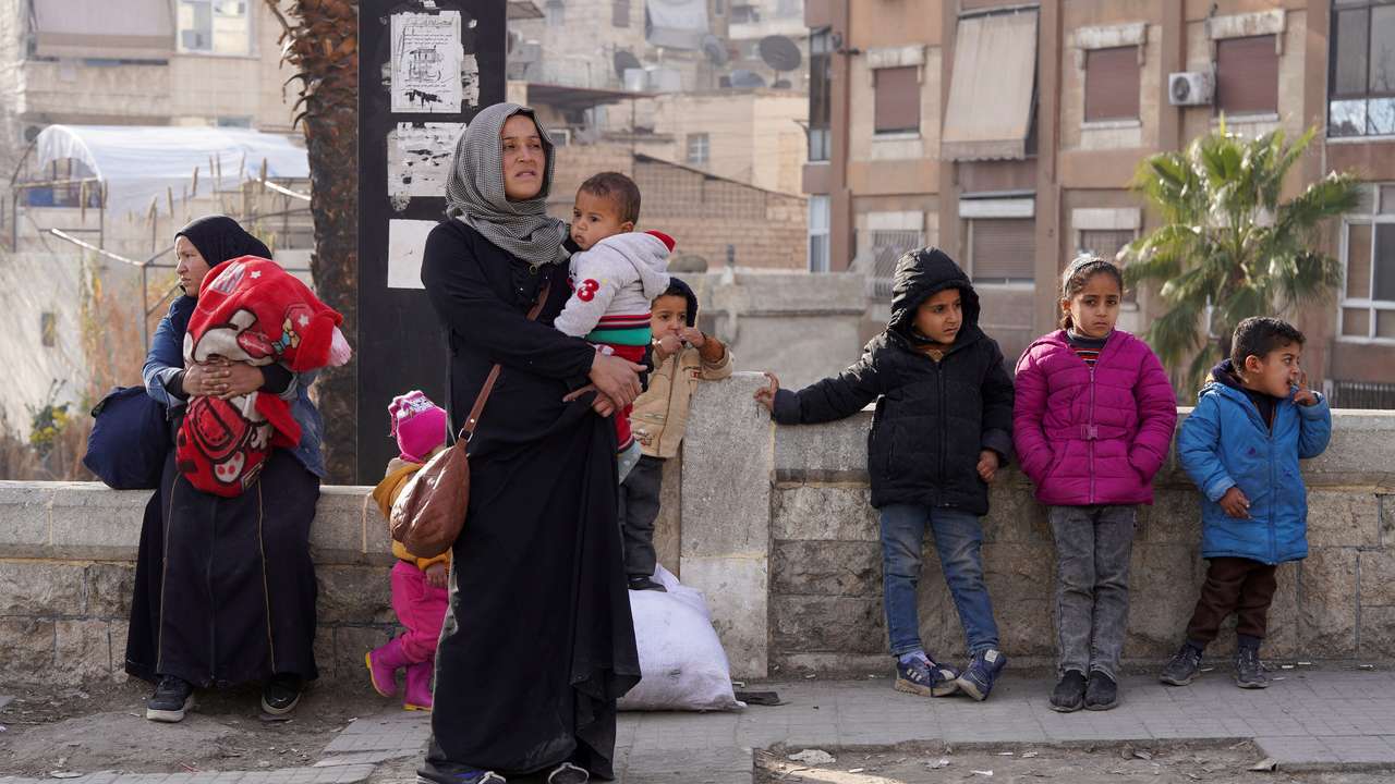 Civilians flee following renewed clashes between the Syrian army and the Syrian Democratic Forces (SDF)