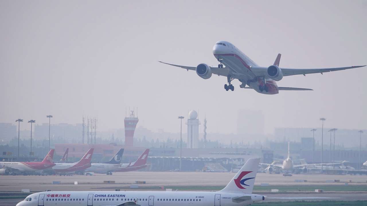 A China Eastern Airlines aircraft and Shanghai Airlines aircraft are seen in Hongqiao International Airport in Shanghai