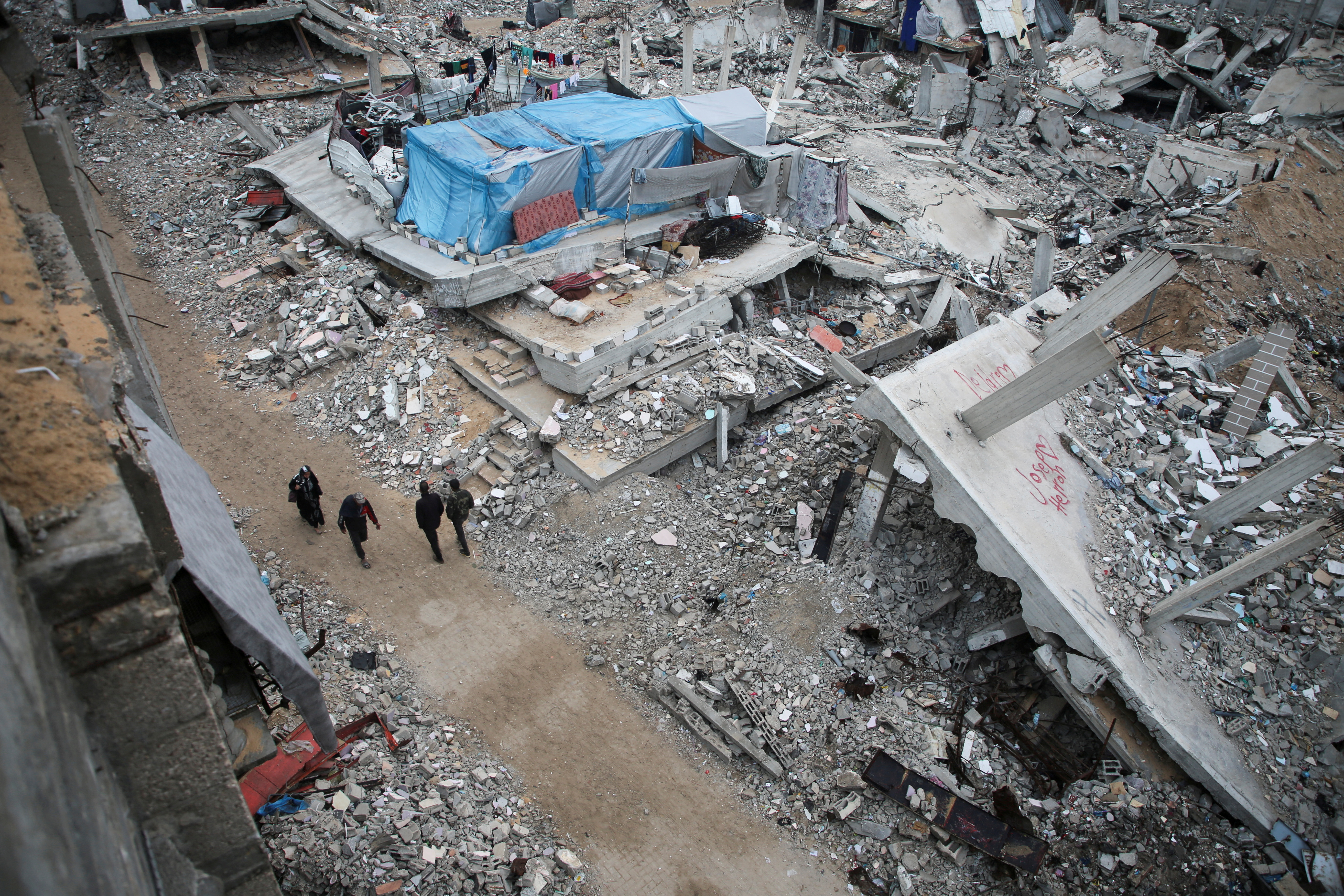 Houses destroyed in previous Israeli strikes lie in ruin, in Khan Younis in the southern Gaza Strip
