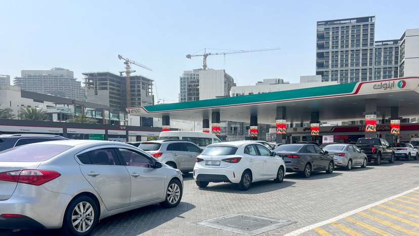Cars queue outside a petrol station, after an Iranian attack, following United States and Israel strikes on Iran, in Dubai