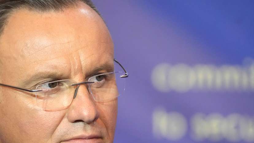 FILE PHOTO: Poland's President Andrzej Duda listens during a press conference in Riga