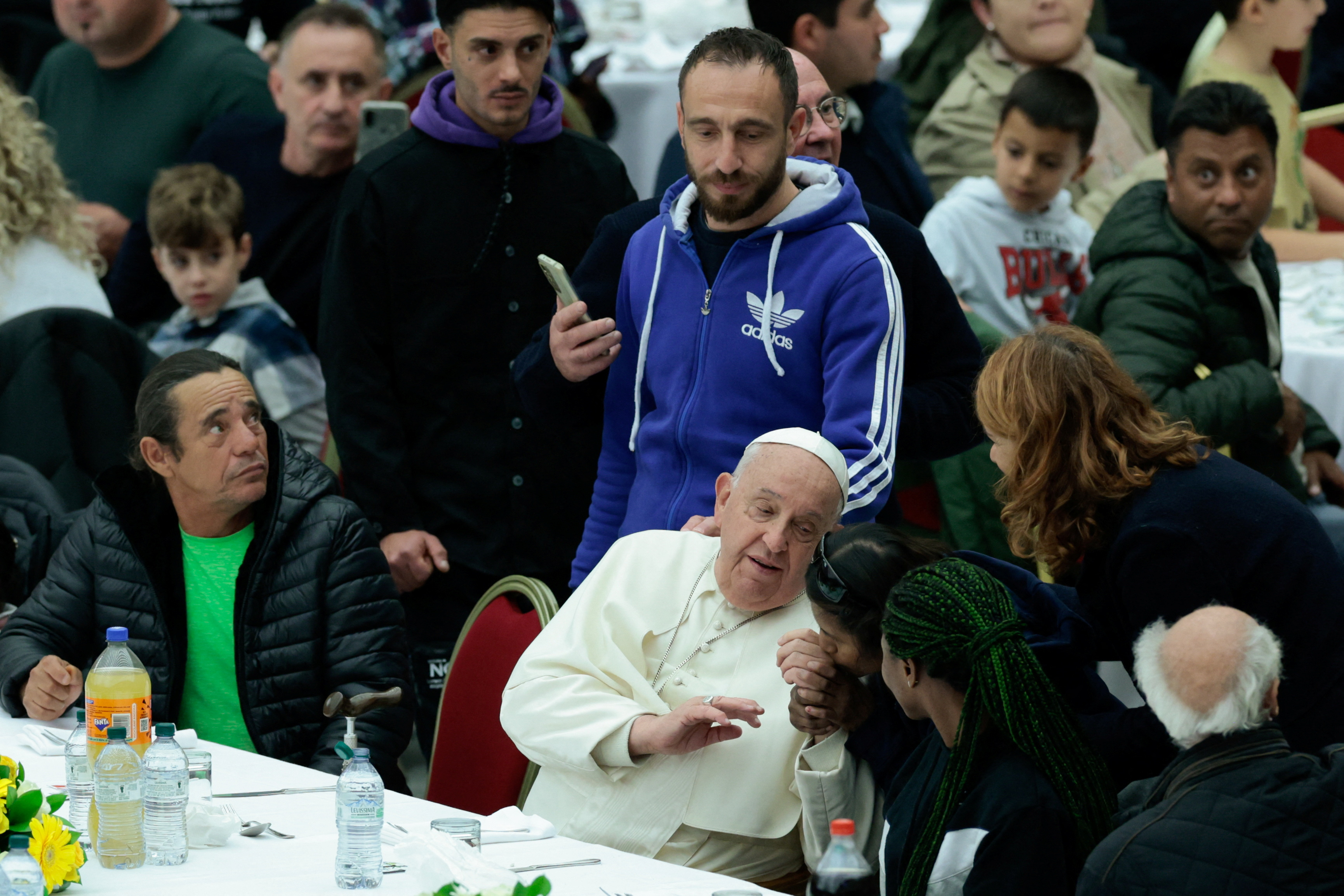Pope Francis participates in a lunch offered by the Vatican to poor people, on the World Day of the Poor at the Vatican