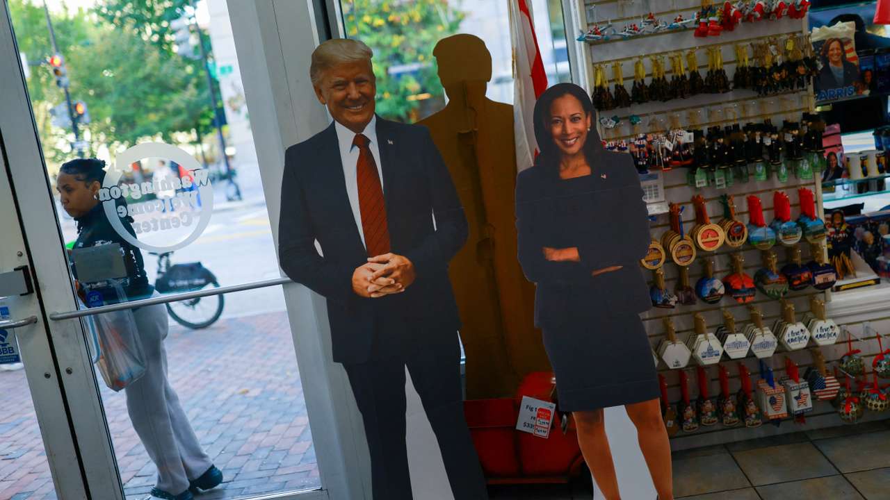 Cutouts of U.S. presidential nominees Trump and Harris are displayed at a souvenir shop, in Washington