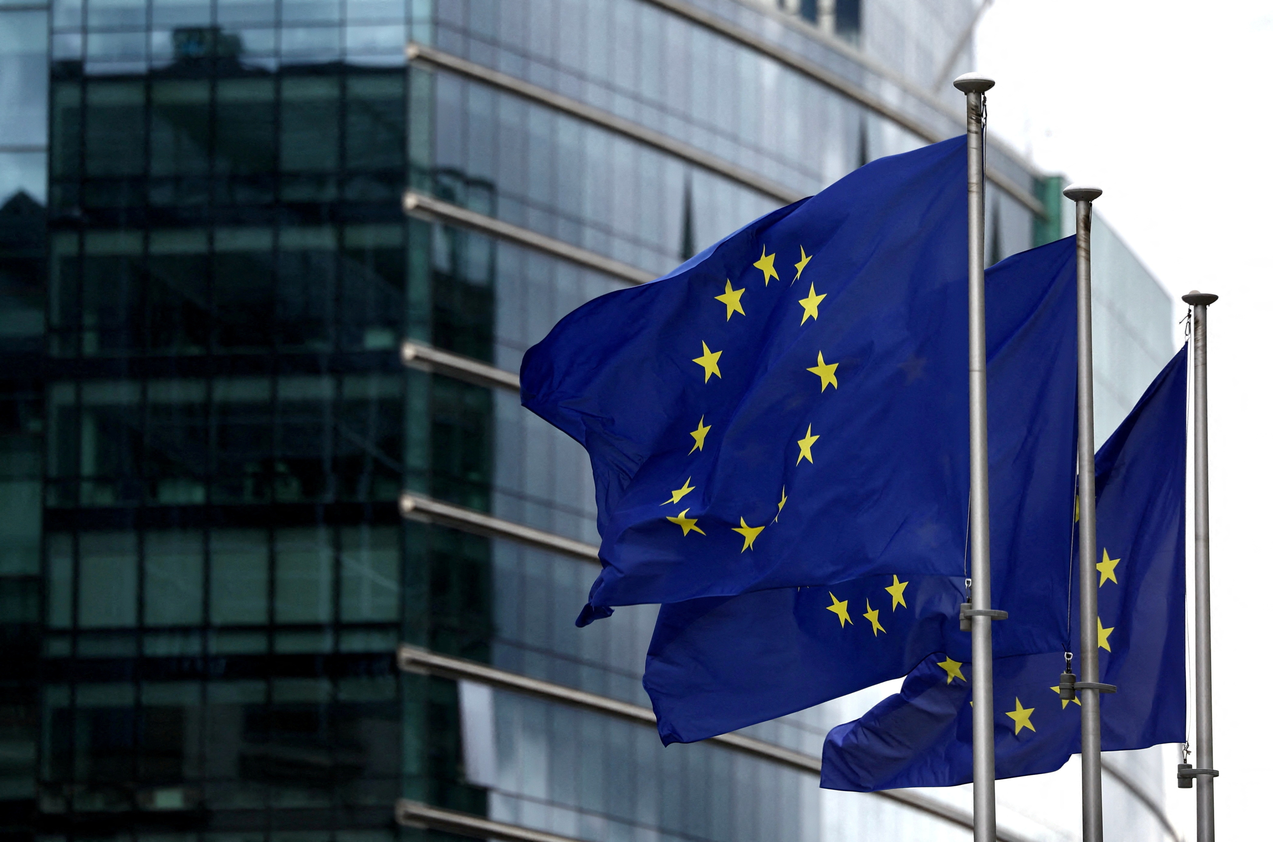 FILE PHOTO: European flags fly outside the European Commission headquarters in Brussels