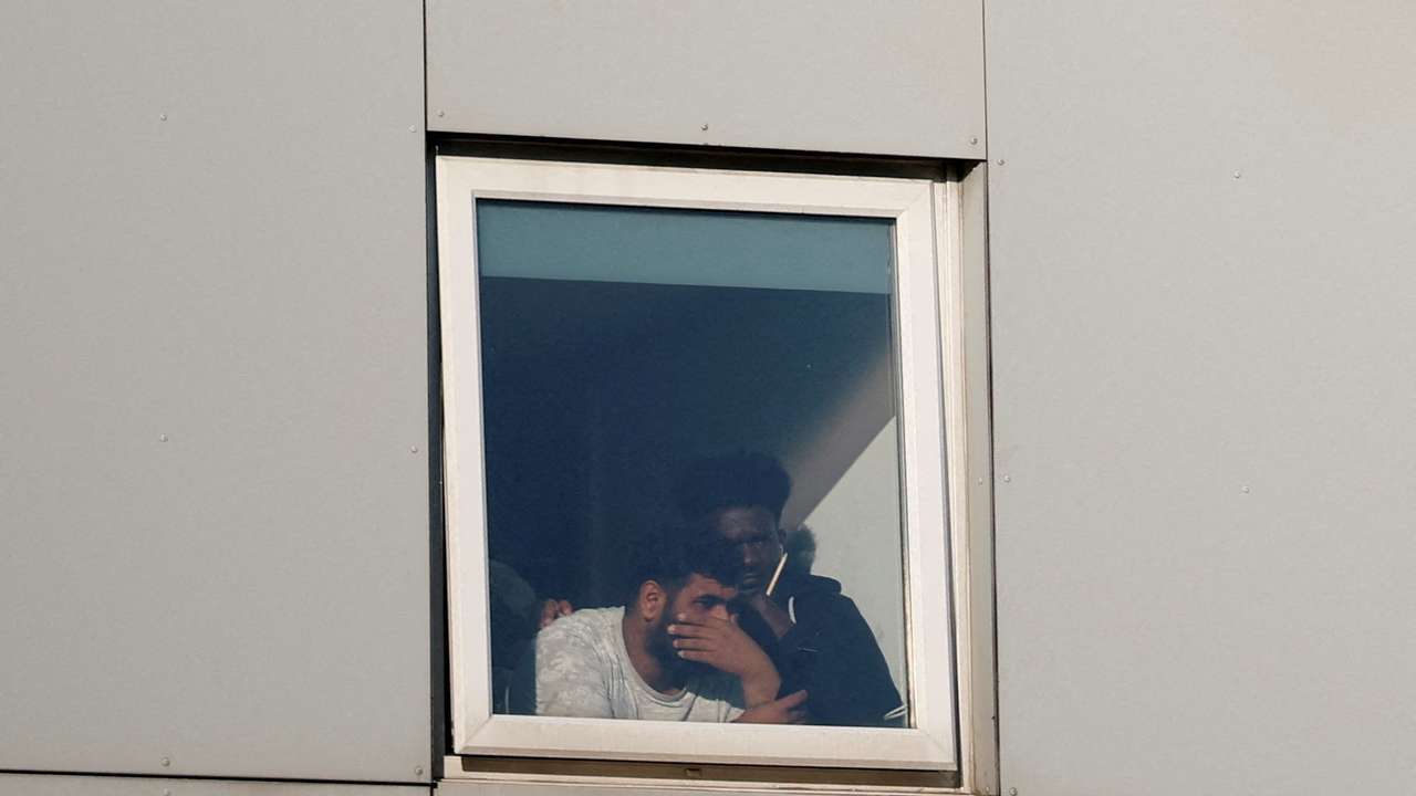 FILE PHOTO: Protesters gather at migrant hotels in cities across Britain