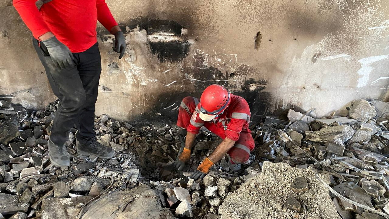 Iranian Red Crescent Society continues rescue efforts in rubble of damaged buildings