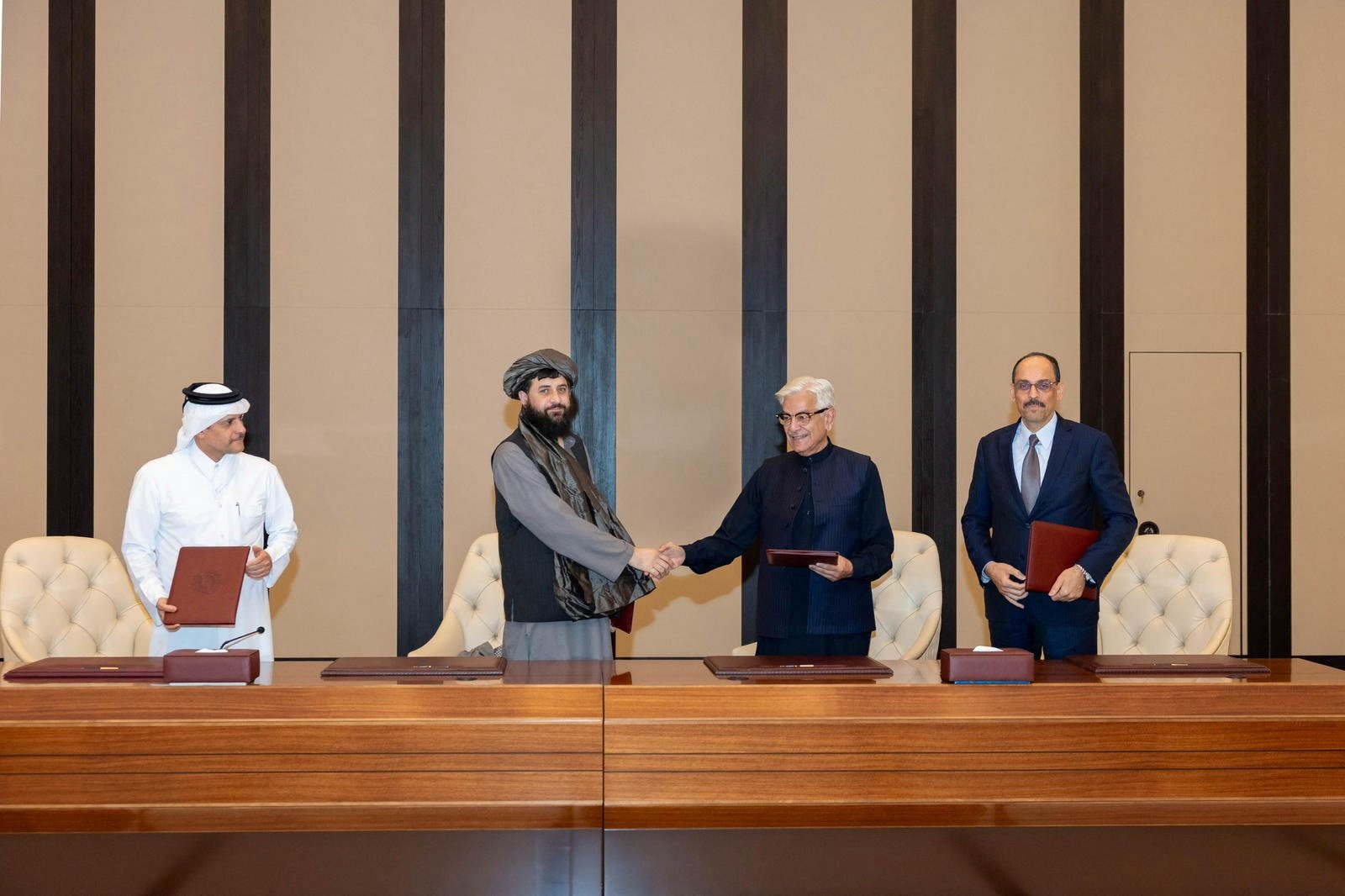 Defence ministers from Afghanistan and Pakistan agree to an immediate ceasefire during talks in Doha