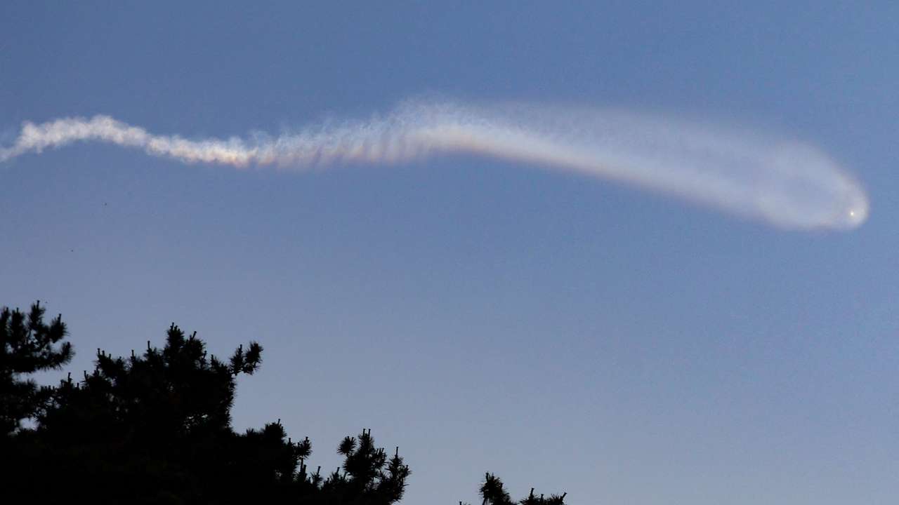 The contrail of North Korean missile is pictured from Yeonpyeong Island