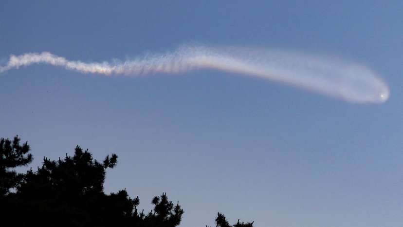 The contrail of North Korean missile is pictured from Yeonpyeong Island