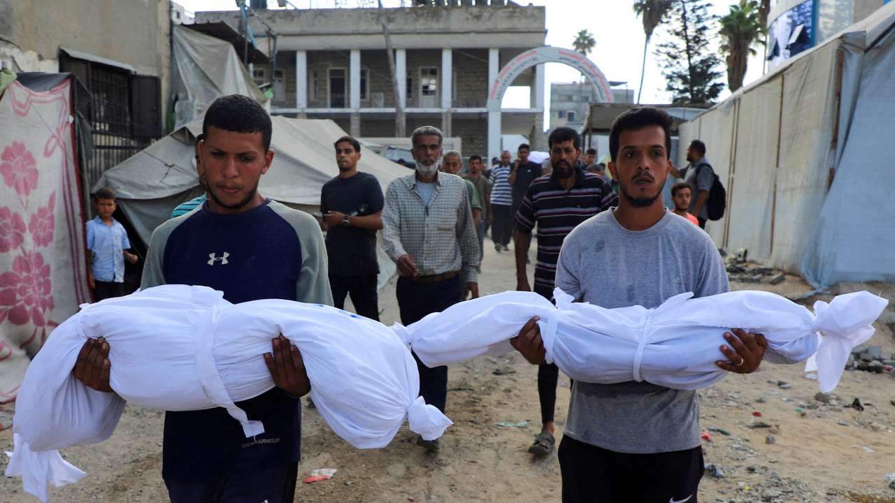 Aftermath of a deadly overnight Israeli strikes on a building where displaced people were taking shelter in Gaza City