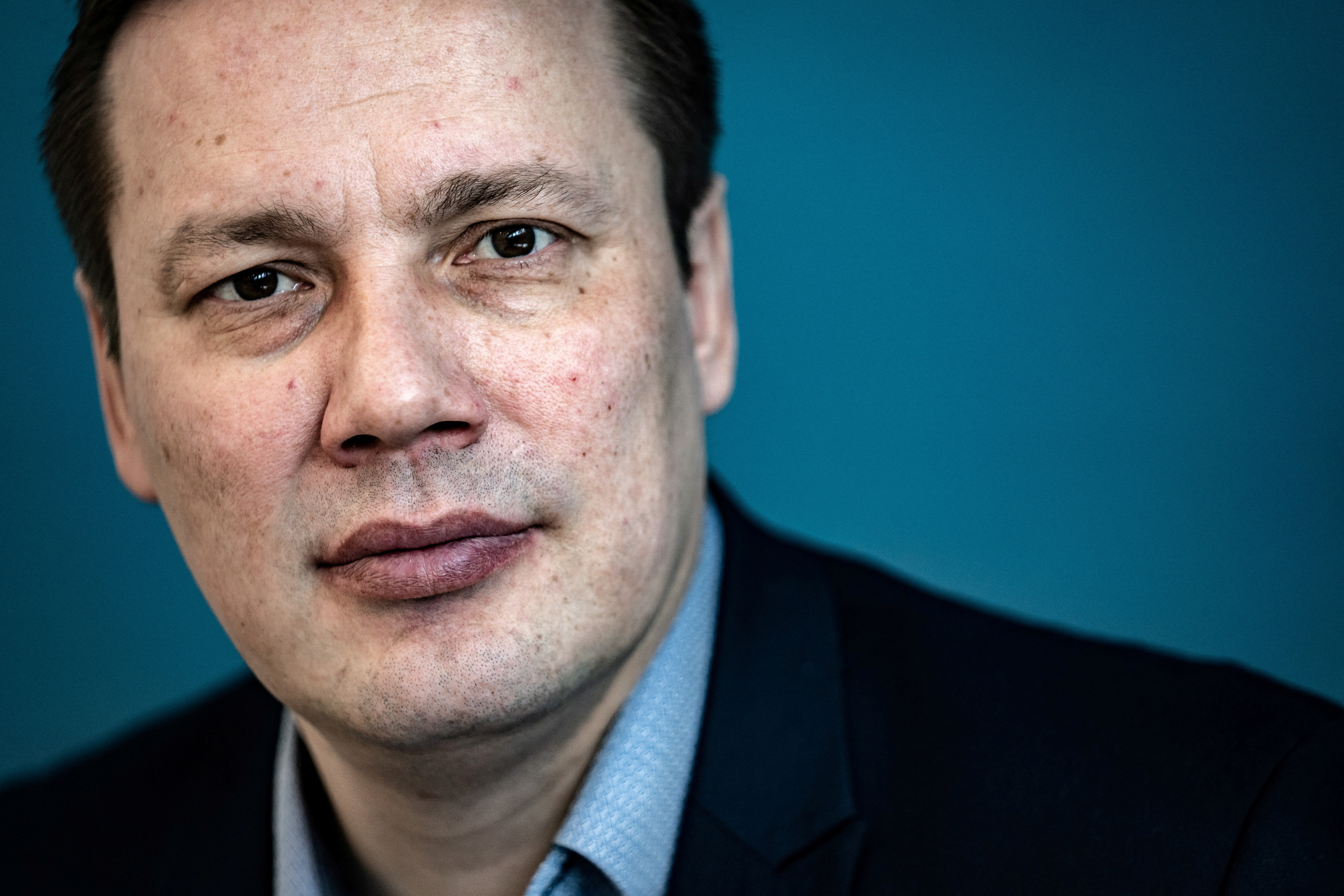 FILE PHOTO: Erik Jensen, Chairman of the party Siumut,  poses at the Greenland Parliament, Inatsisartut, ahead of parliamentary election, in Nuuk