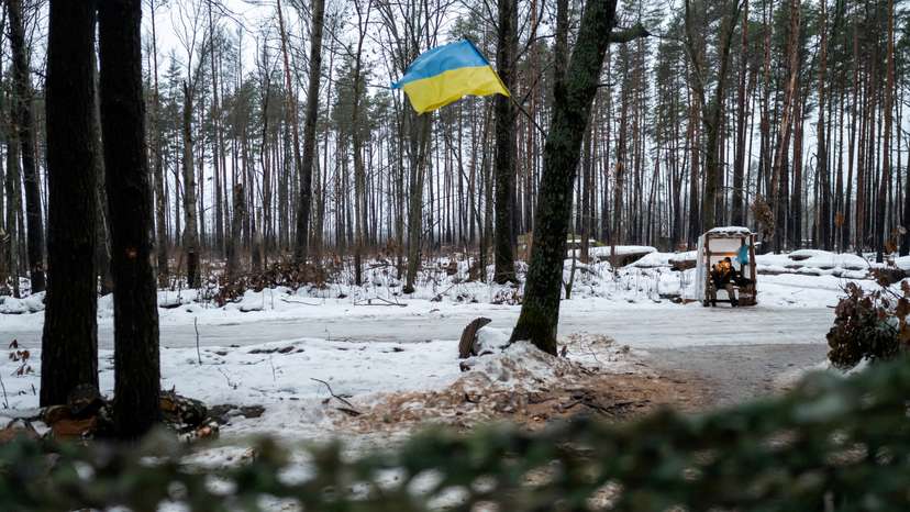 FILE PHOTO: Ukrainian service member is seen at a position near the border with Belarus, in Zhytomyr region