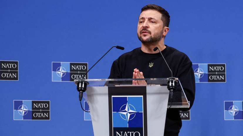 FILE PHOTO: Ukraine's President Volodymyr Zelenskiy attends a press conference, in Brussels