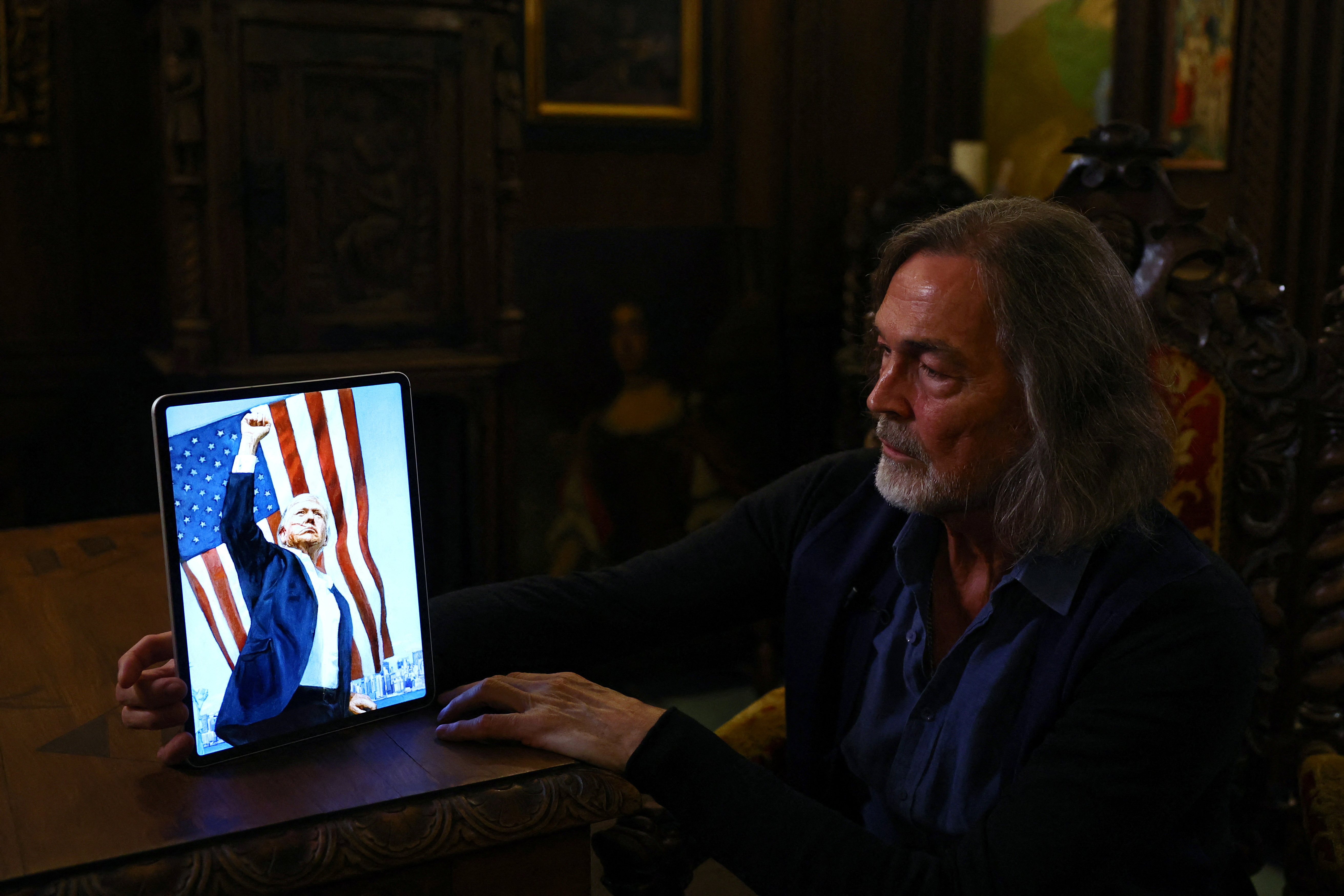 Russian artist Nikas Safronov attends an interview with Reuters in Moscow