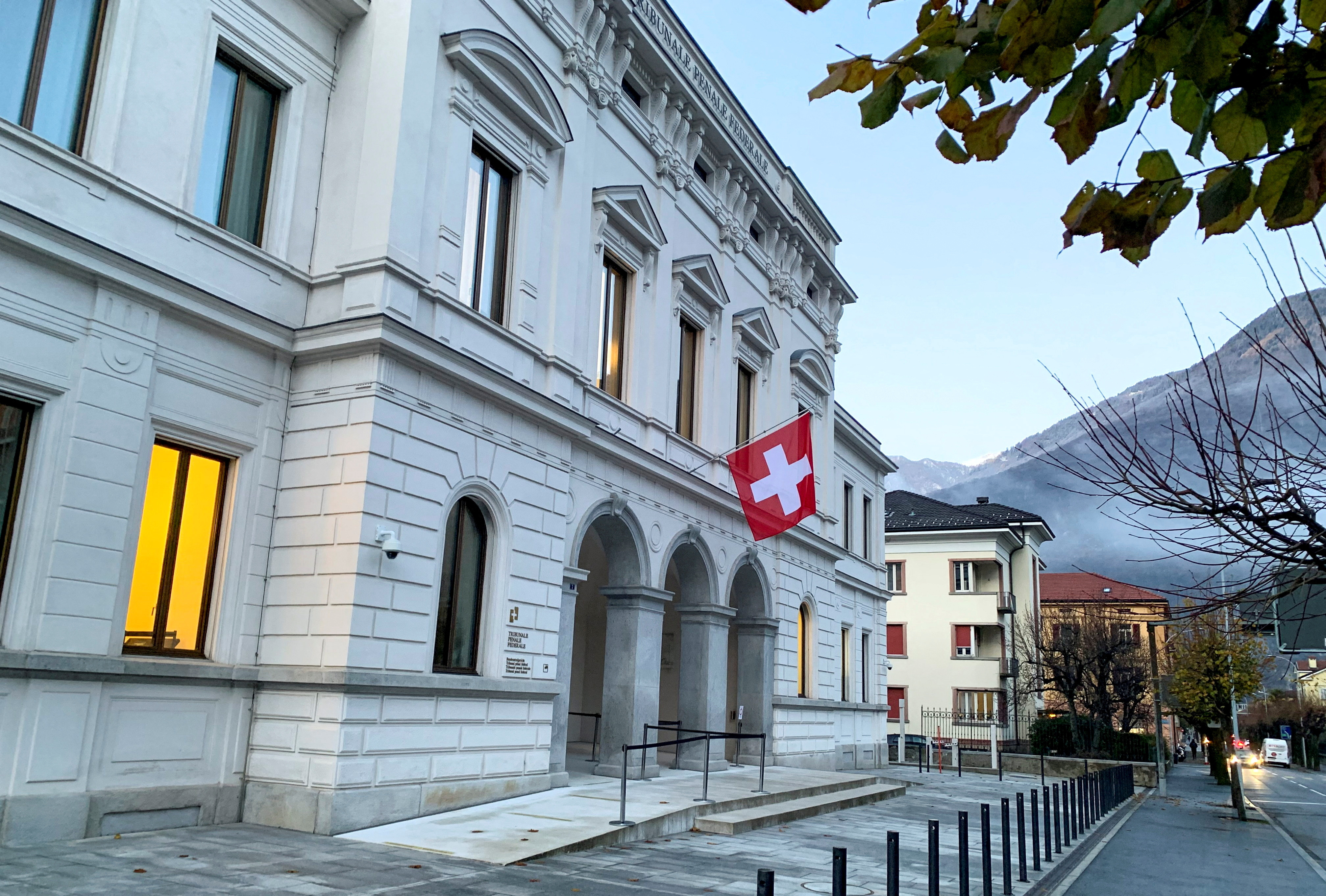 FILE PHOTO: Switzerland's national flag is displayed on the Swiss Federal Criminal Court building in Bellinzona