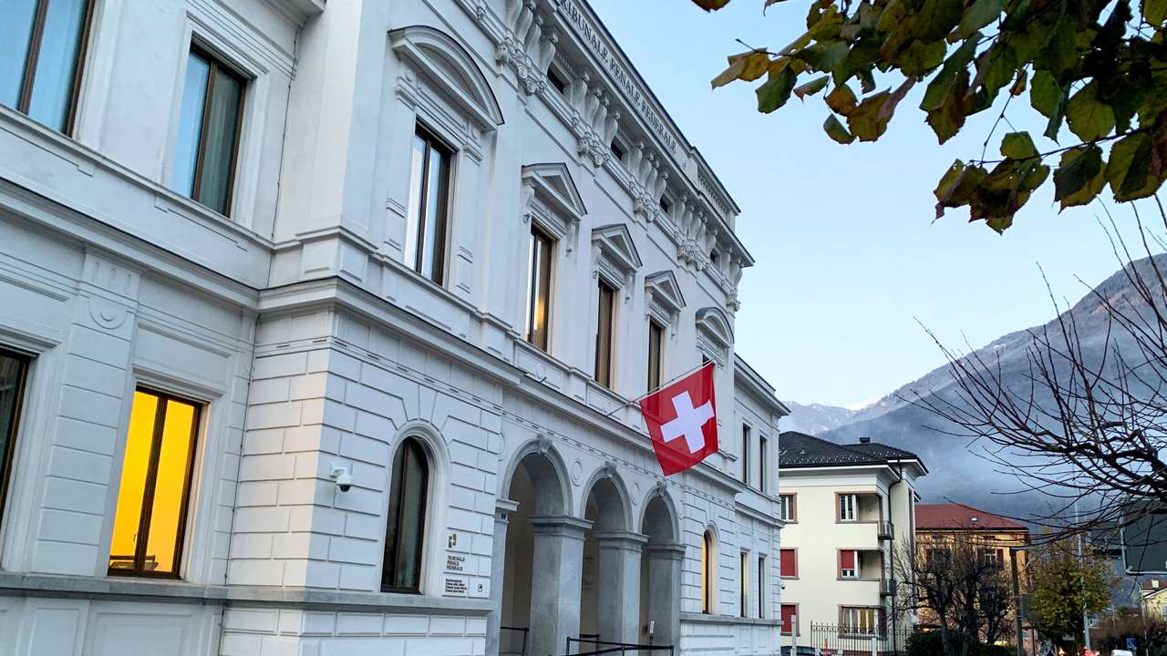 FILE PHOTO: Switzerland's national flag is displayed on the Swiss Federal Criminal Court building in Bellinzona