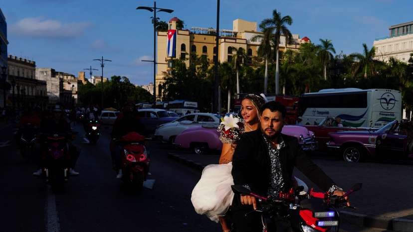 Bride and groom opt for electric motorcycles instead of limos amidst fuel shortage in Cuba