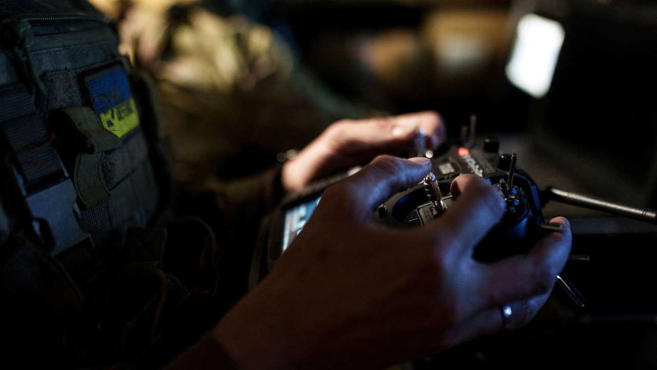 FILE PHOTO: Ukrainian serviceman controls a heavy combat drone while it flies over positions of Russian troops in Donetsk region