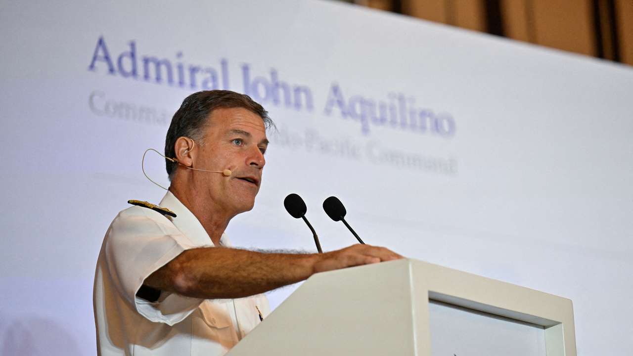 FILE PHOTO: Admiral John C. Aquilino, Commander of the United States Indo-Pacific Command speaks at the IISS Special Lecture in Singapore
