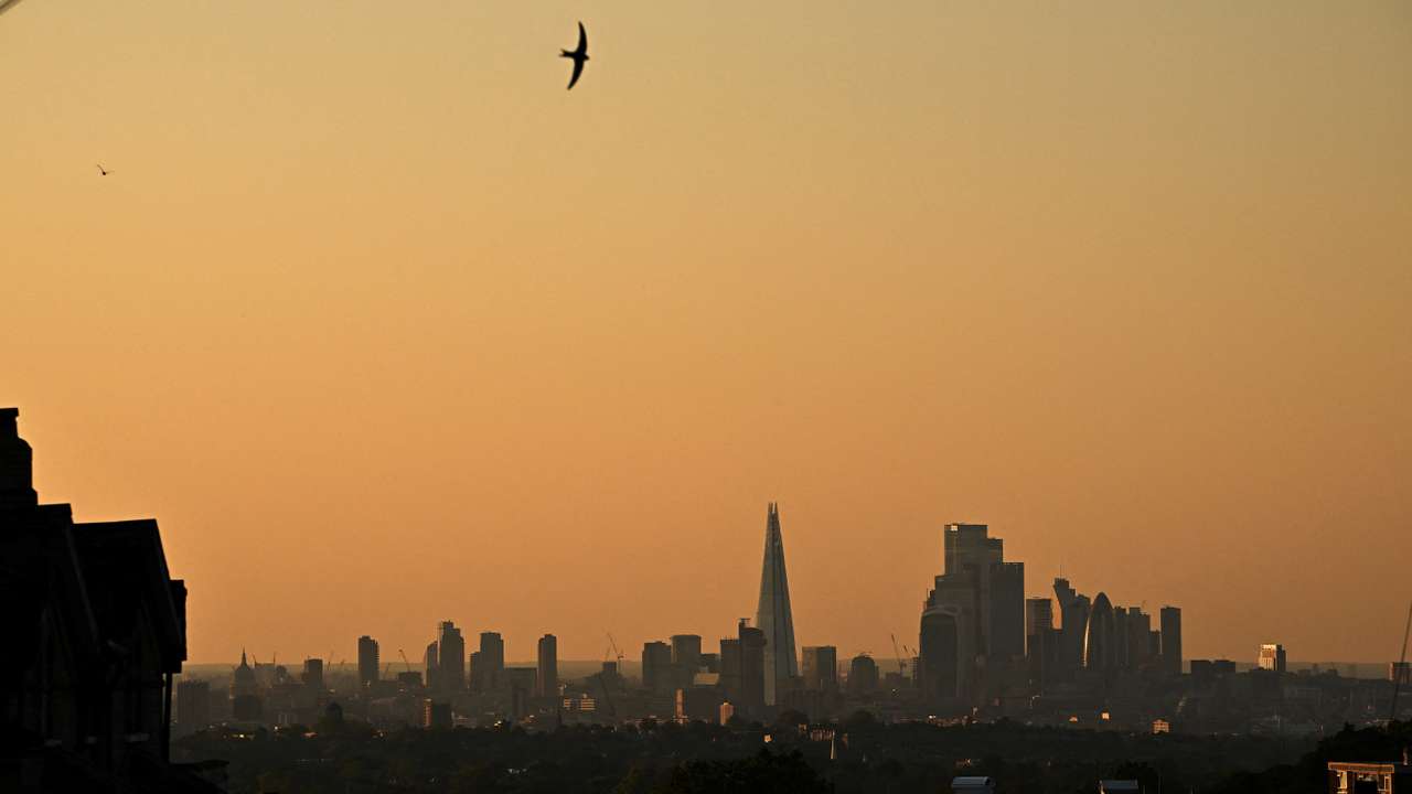 The sun sets over the capital’s skyline as warm temperatures, trigger a ‘high’ alert for air pollution, in London