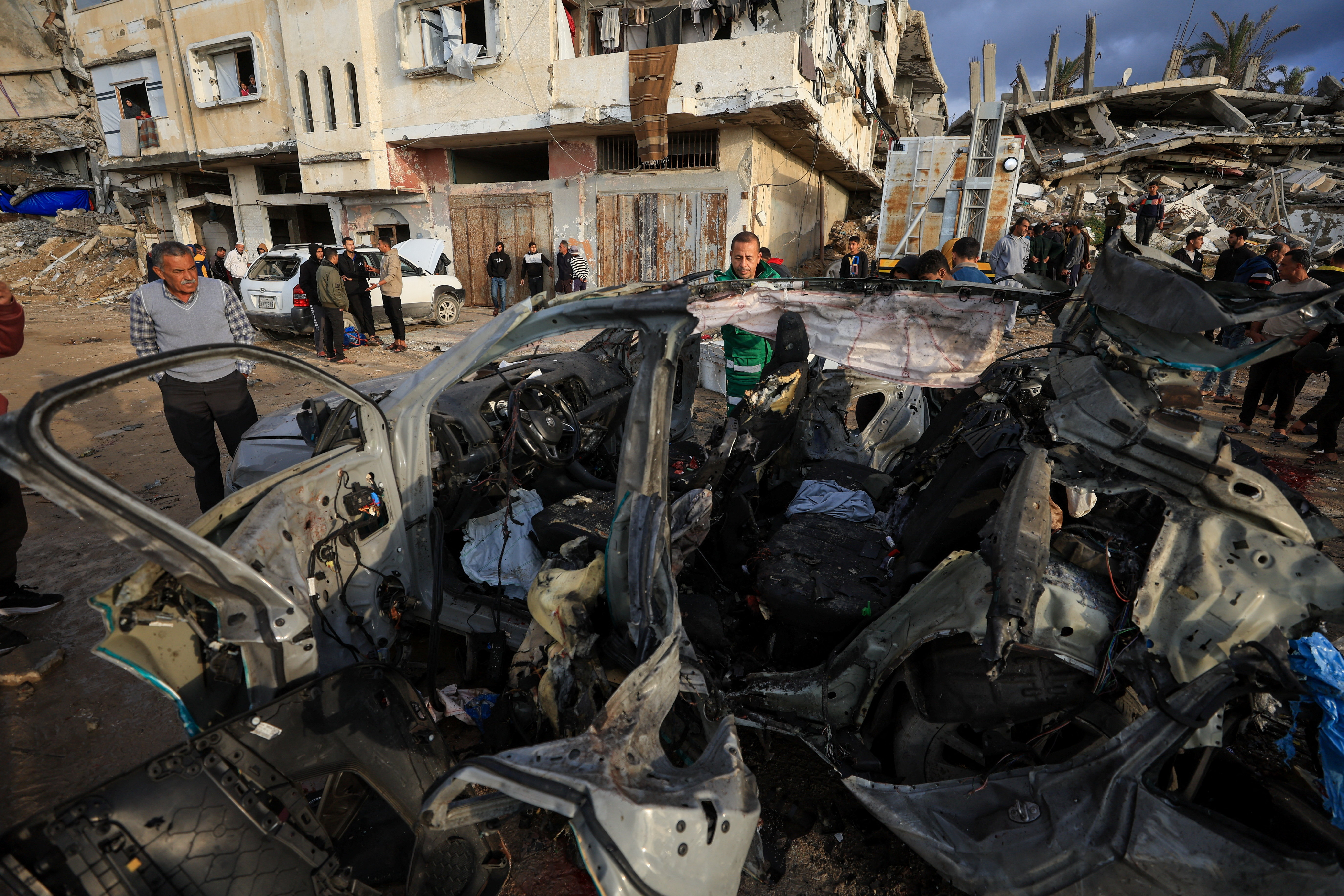 Aftermath of an Israeli strike on a car in Gaza City,