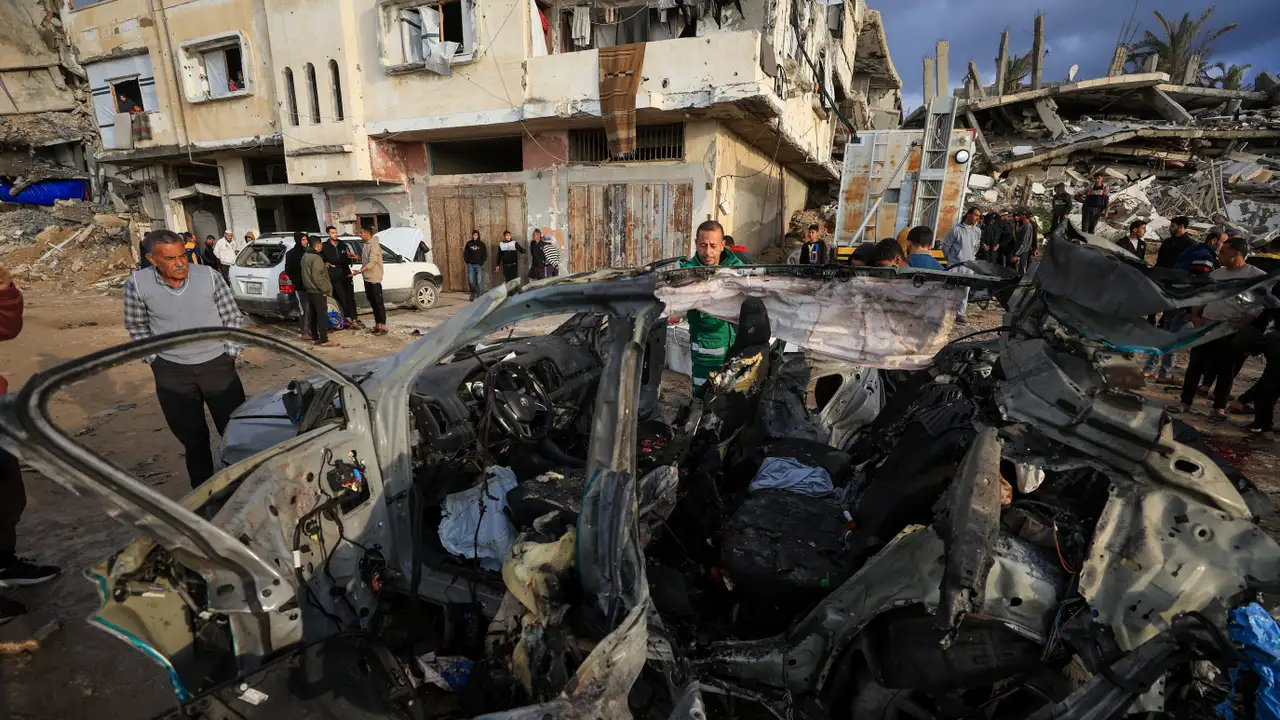 Aftermath of an Israeli strike on a car in Gaza City,