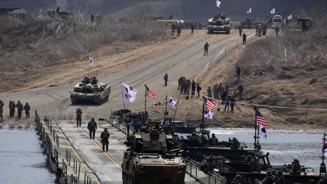 FILE PHOTO: South Korean and US soldiers conduct a joint river-crossing exercise in Yeoncheon