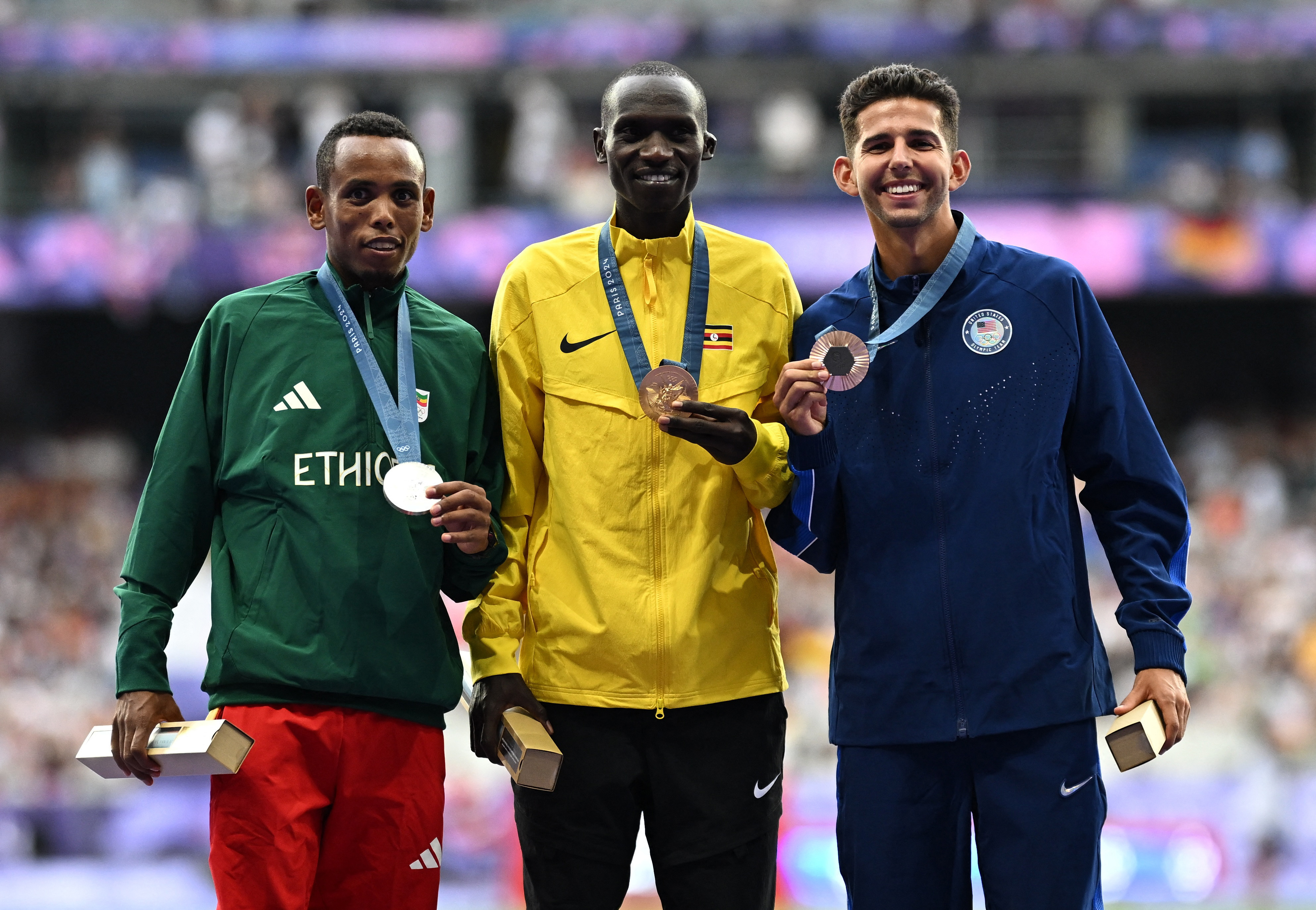 Athletics - Men's 10,000m Victory Ceremony