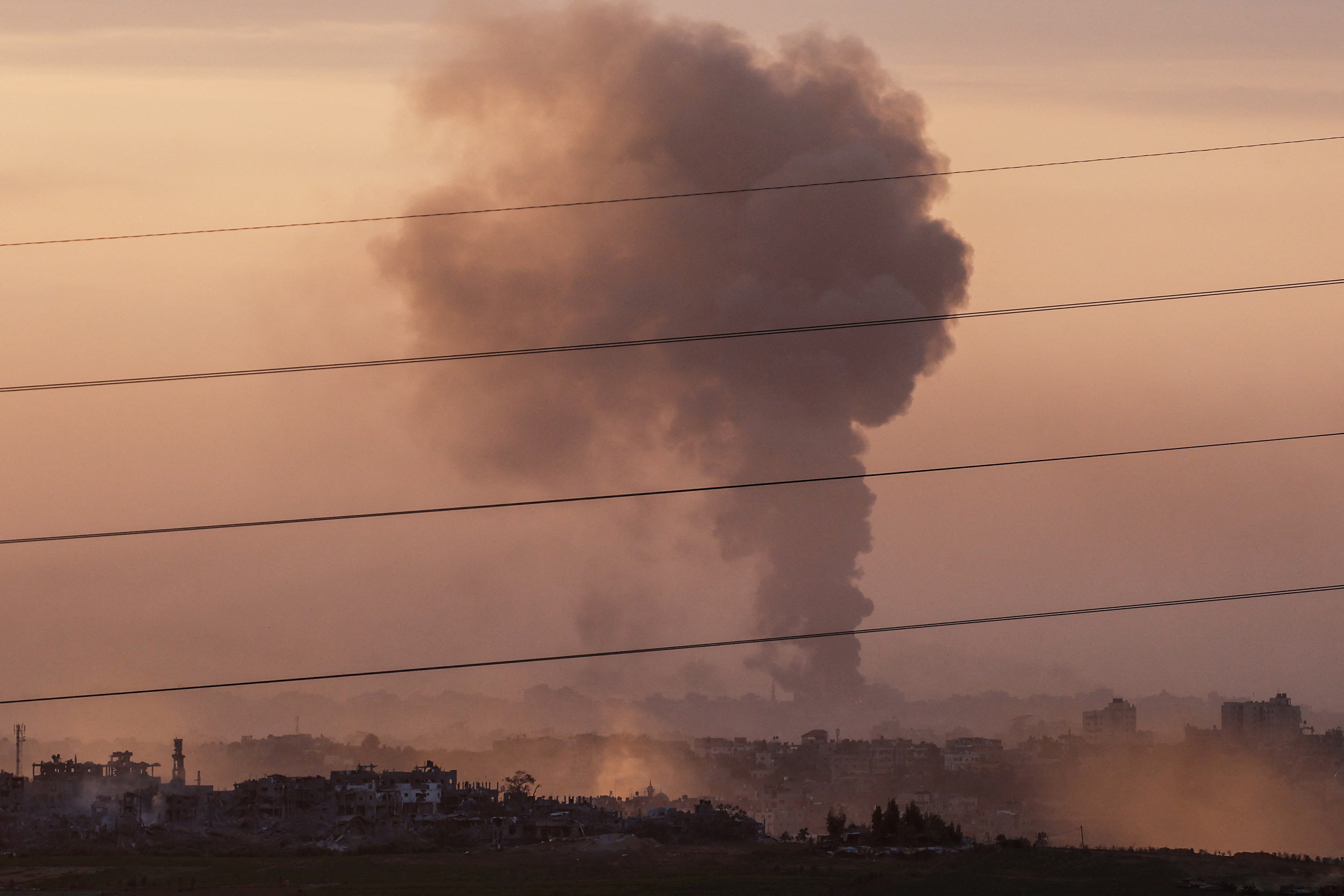 Smoke rises over Gaza, as seen from Israel's border with Gaza, in southern Israel