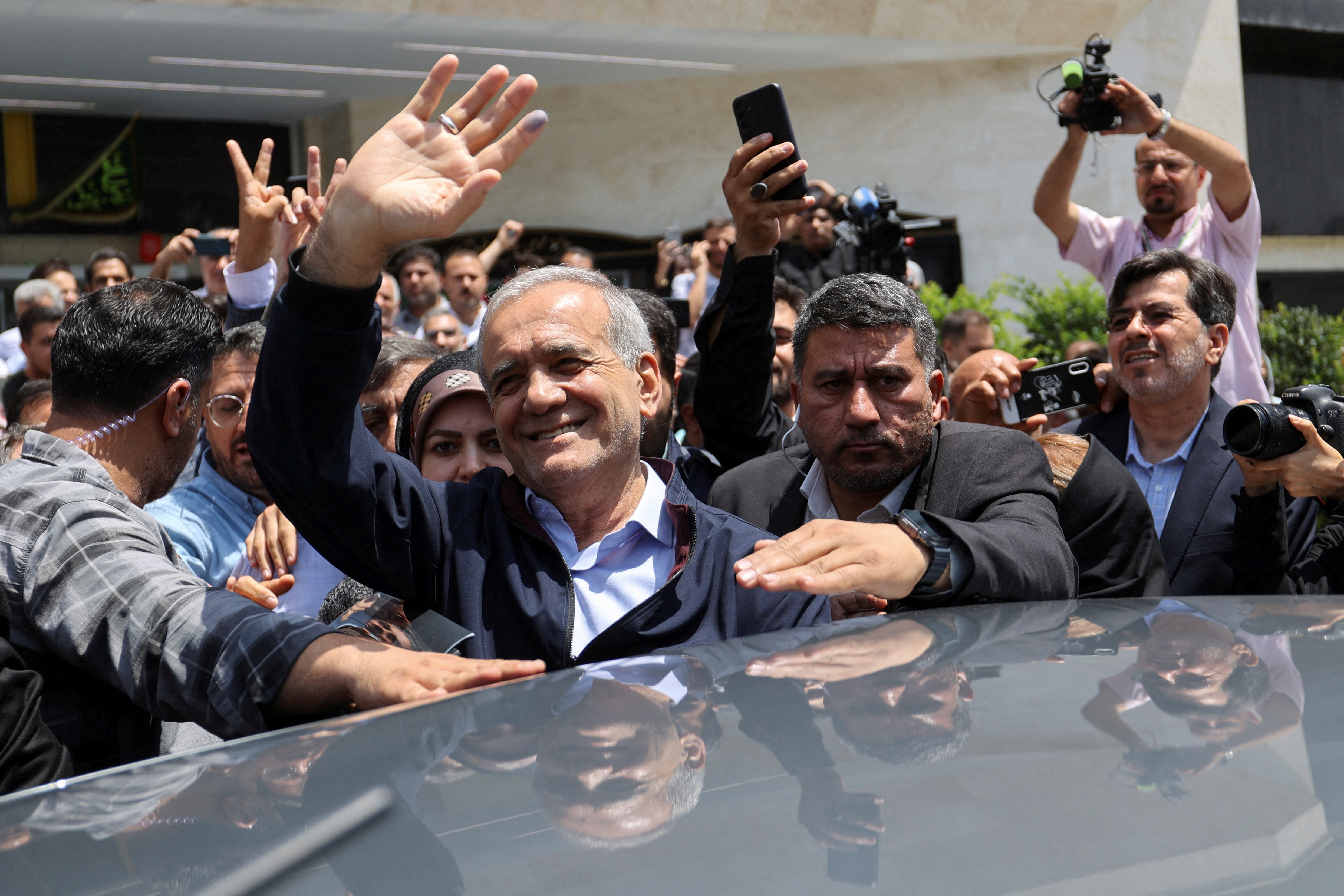 FILE PHOTO: Iranians vote in snap presidential election