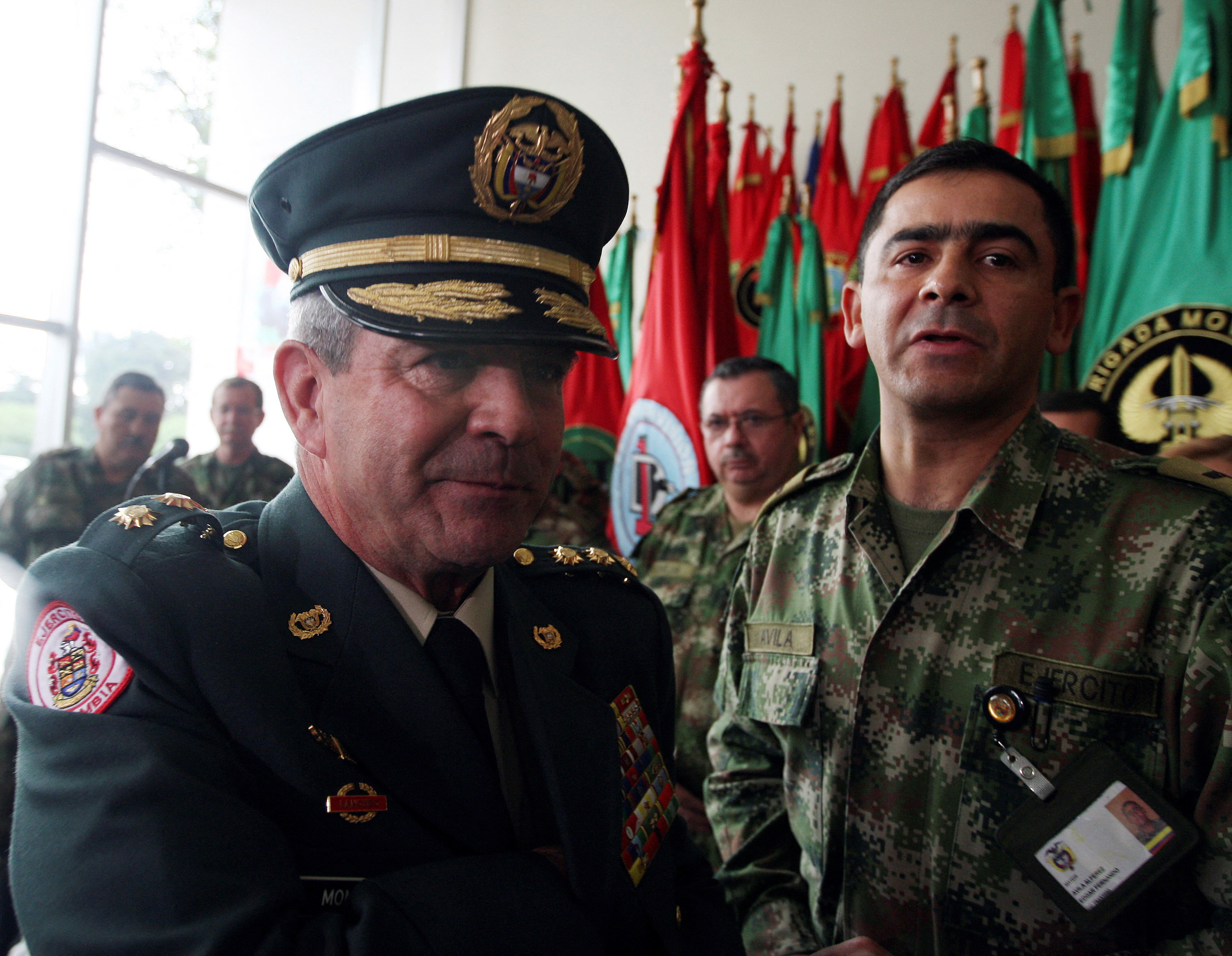 FILE PHOTO: Colombia's army commander General Montoya gestures after announcing his resignation to media in Bogota