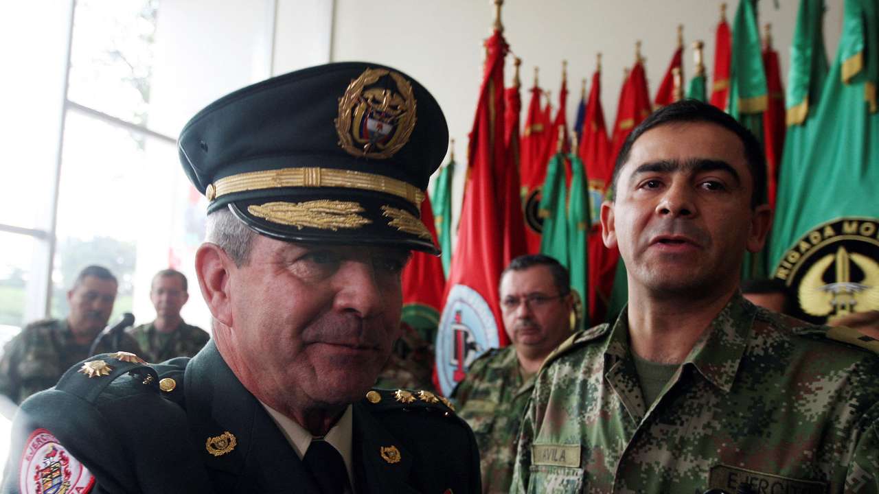 FILE PHOTO: Colombia's army commander General Montoya gestures after announcing his resignation to media in Bogota