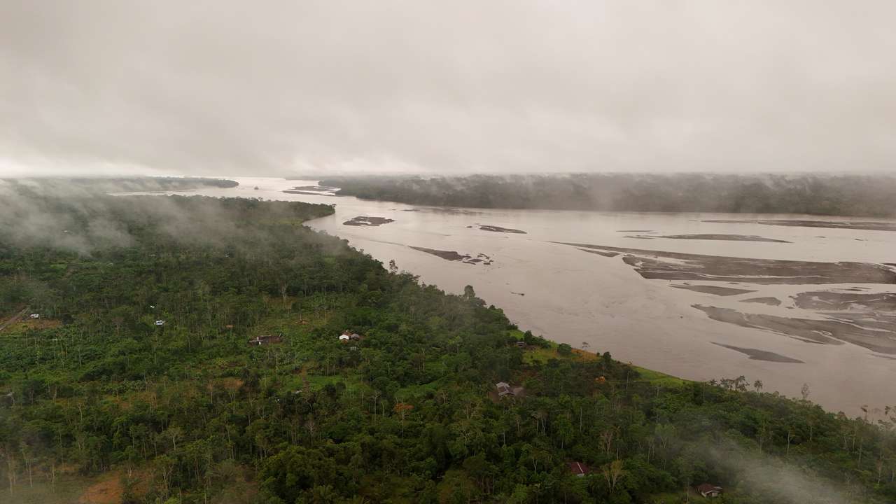 A drone view shows the Coca River, scarred by repeated oil spills, as members of the Kichwa community protest to demand justice and dialogue five years after a devastating environmental disaster, in Coca, Ecuador, June 30, 2025. REUTERS/Karen Toro