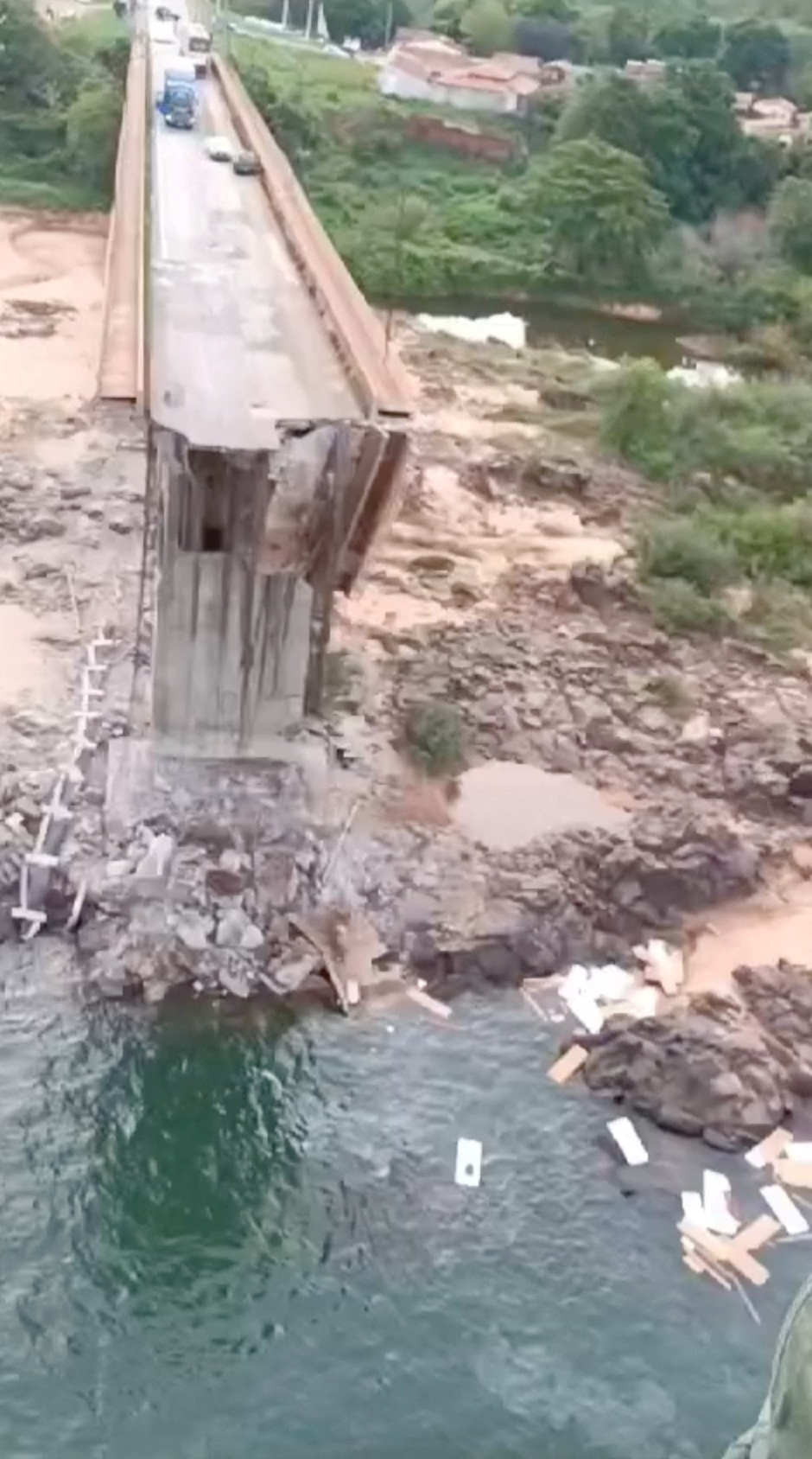 An aerial view shows a collapsed bridge near Aguiarnopolis and Estreito, in Brazil
