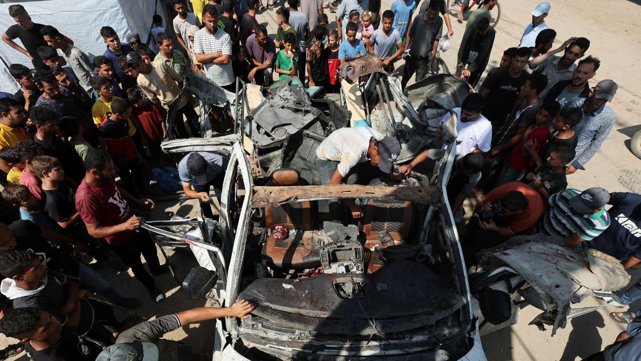 Aftermath of an Israeli strike on a vehicle in Deir Al-Balah in the central Gaza Strip