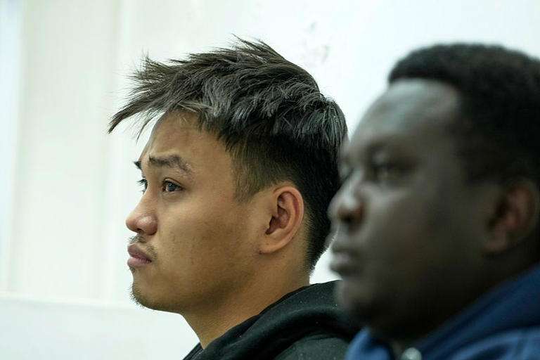 Vietnamese national Duh Hung Nguyen, left, and Kenyan national Dennis Ng'ang'a at the Jomo Kenyatta International Airport Law Courts in Nairobi, 15 April, 2025 AP Photo
