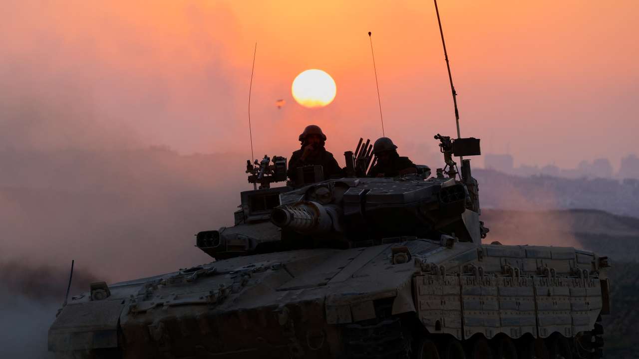 An Israeli tank manoeuvres, amid the Israel-Hamas conflict, near the Israel-Gaza border, in Israel