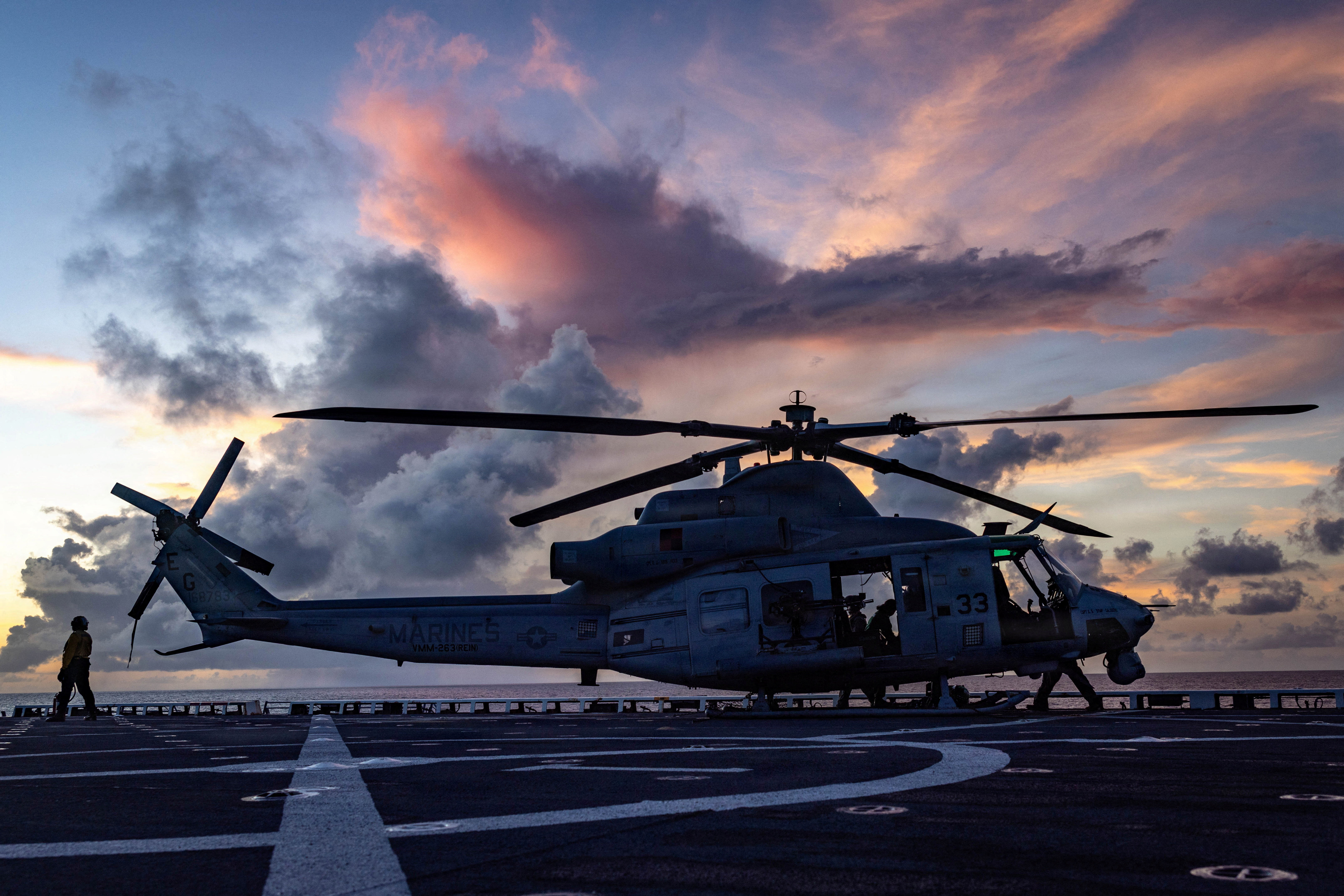 U.S. Marines UH-1Y Venom helicopter is prepared for flight operations in the Caribbean Sea