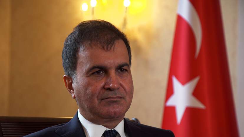 Turkey's European Union Affairs Minister Omer Celik speaks during an interview with Reuters at the Turkish Embassy in London