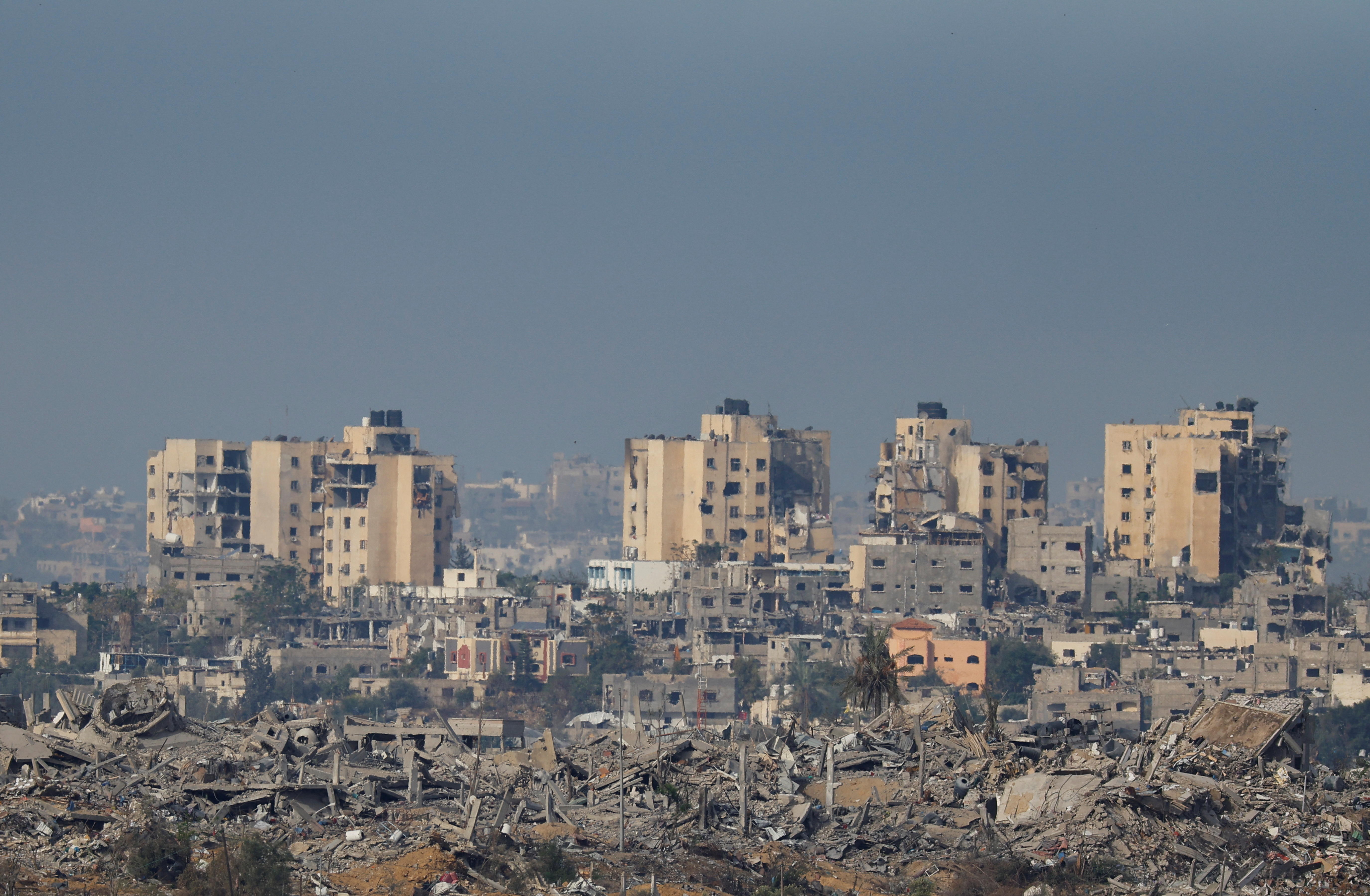 A view of destroyed buildings in Gaza, as seen from southern Israel