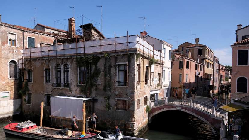 Beginning of the restoration process of Banksy's 'Migrant Child', in Venice