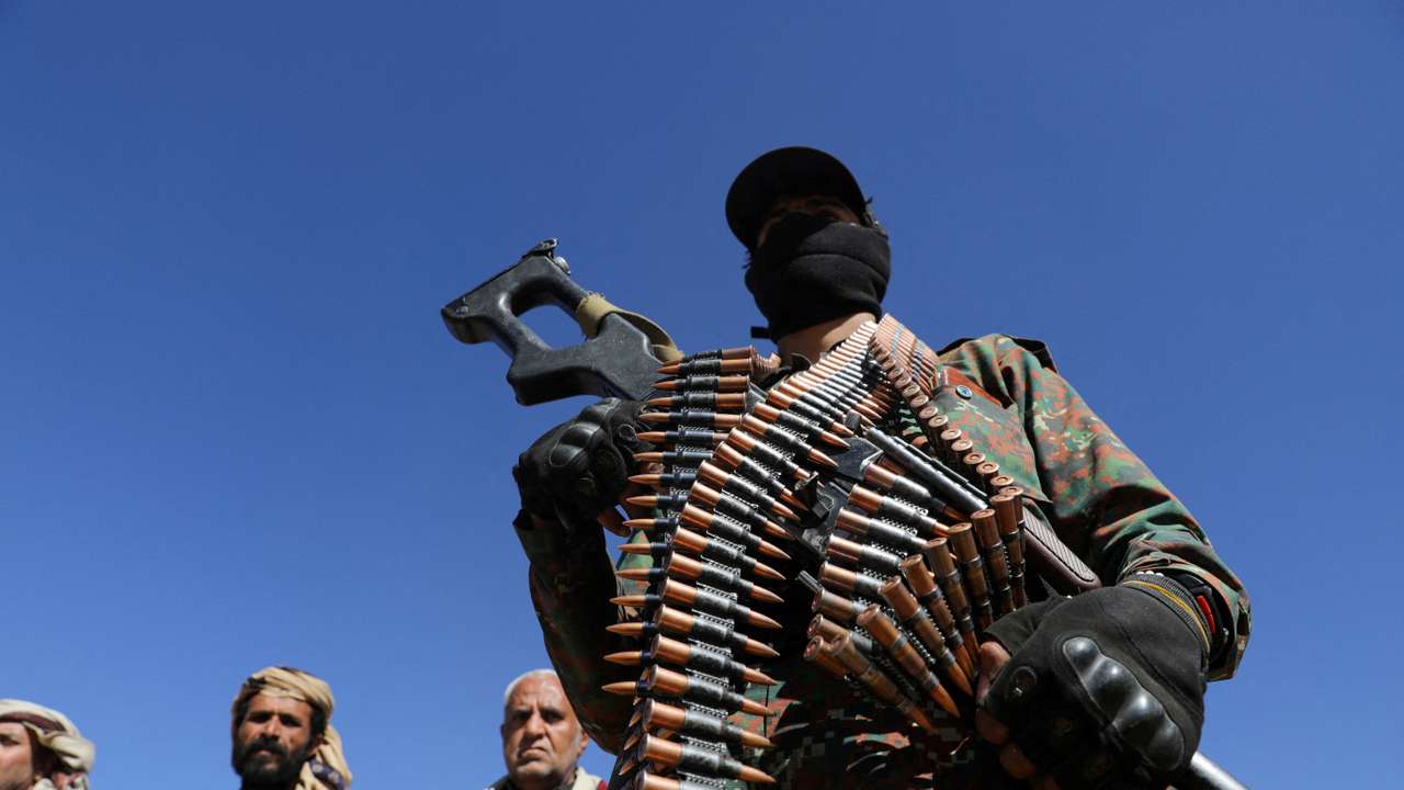 FILE PHOTO: Houthi policeman takes part in a protest against recent U.S.-led strikes on Houthi targets, near Sanaa