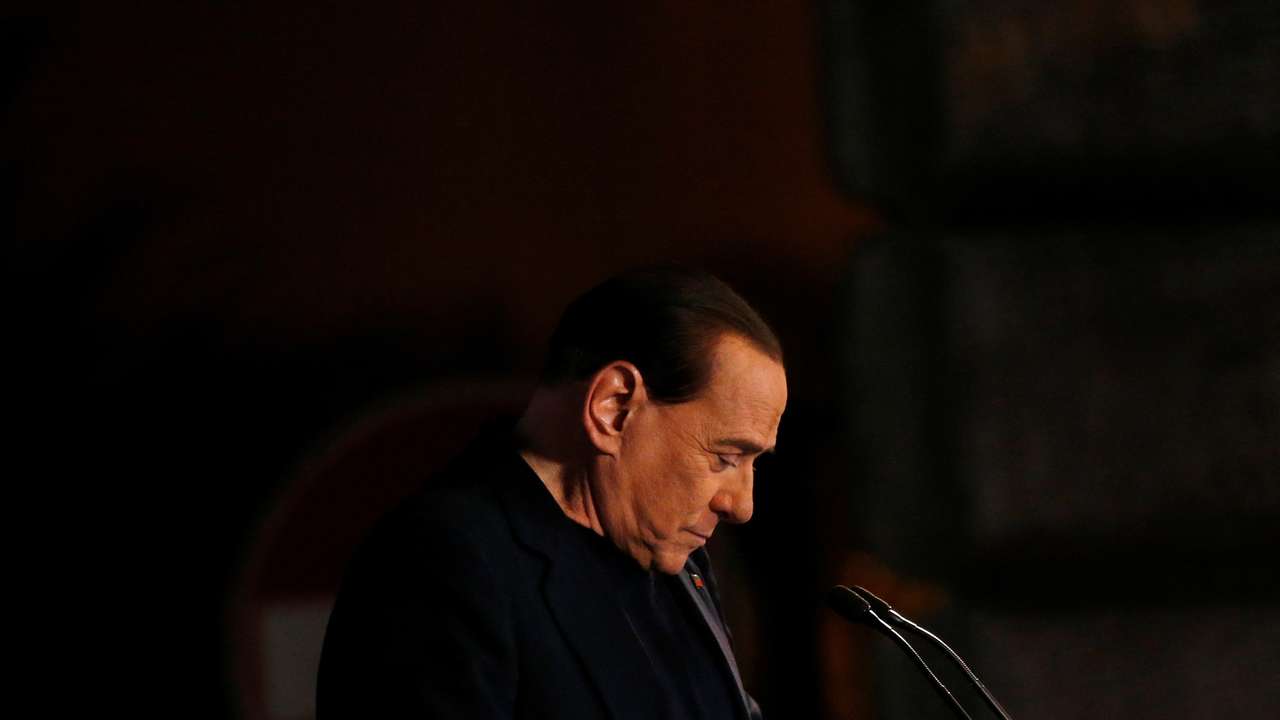 FILE PHOTO: Former Prime Minister Silvio Berlusconi delivers a speech from the stage in downtown Rome