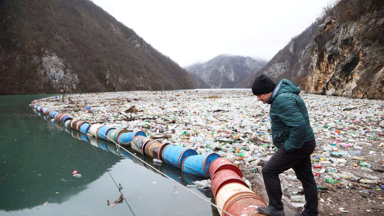 Tonnes of waste float the Drina river in Visegrad