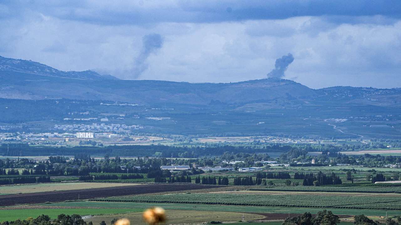 Smoke rises above Lebanon, following an Israeli strike, amid ongoing cross-border hostilities between Hezbollah and Israeli forces, as seen from Israel's border with Lebanon