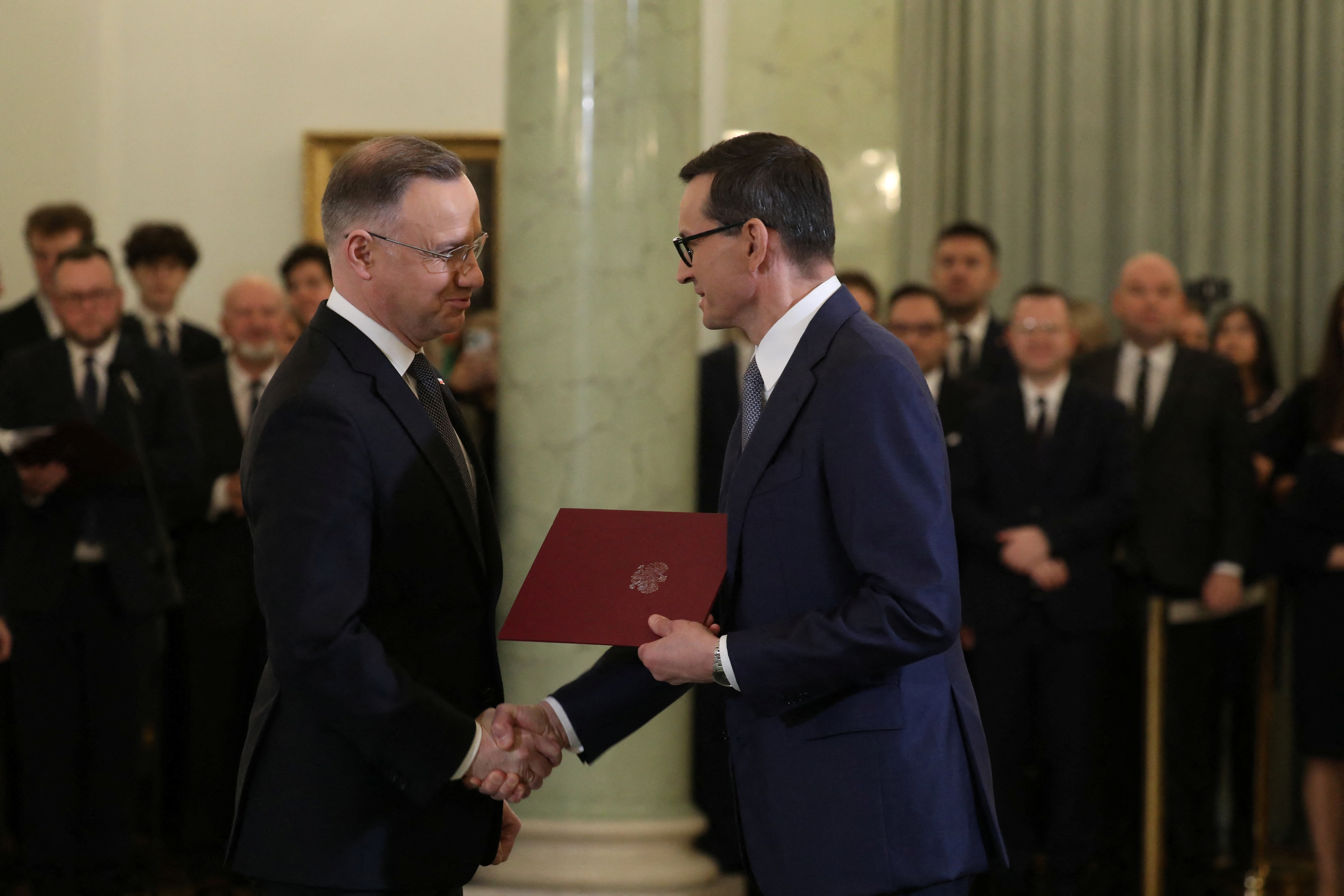 Poland's Morawiecki sworn in as prime minister ahead of confidence vote, in Warsaw