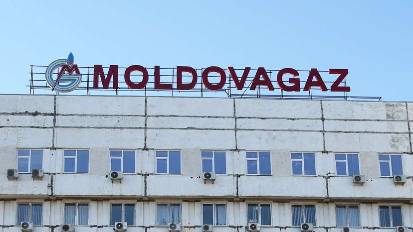 FILE PHOTO: The logo of the Moldovagaz energy company is seen on the facade of the building in Chisinau