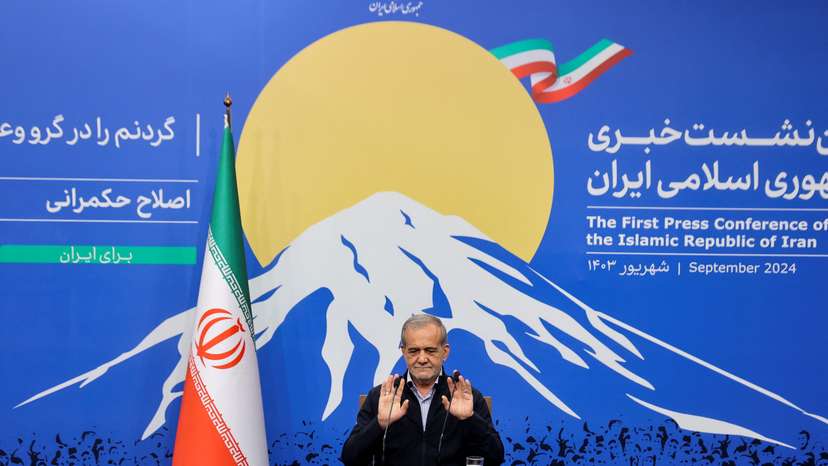 Iran's President Masoud Pezeshkian attends a press conference in Tehran