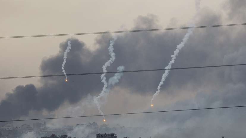 Flares fall over Gaza, as seen from southern Israel