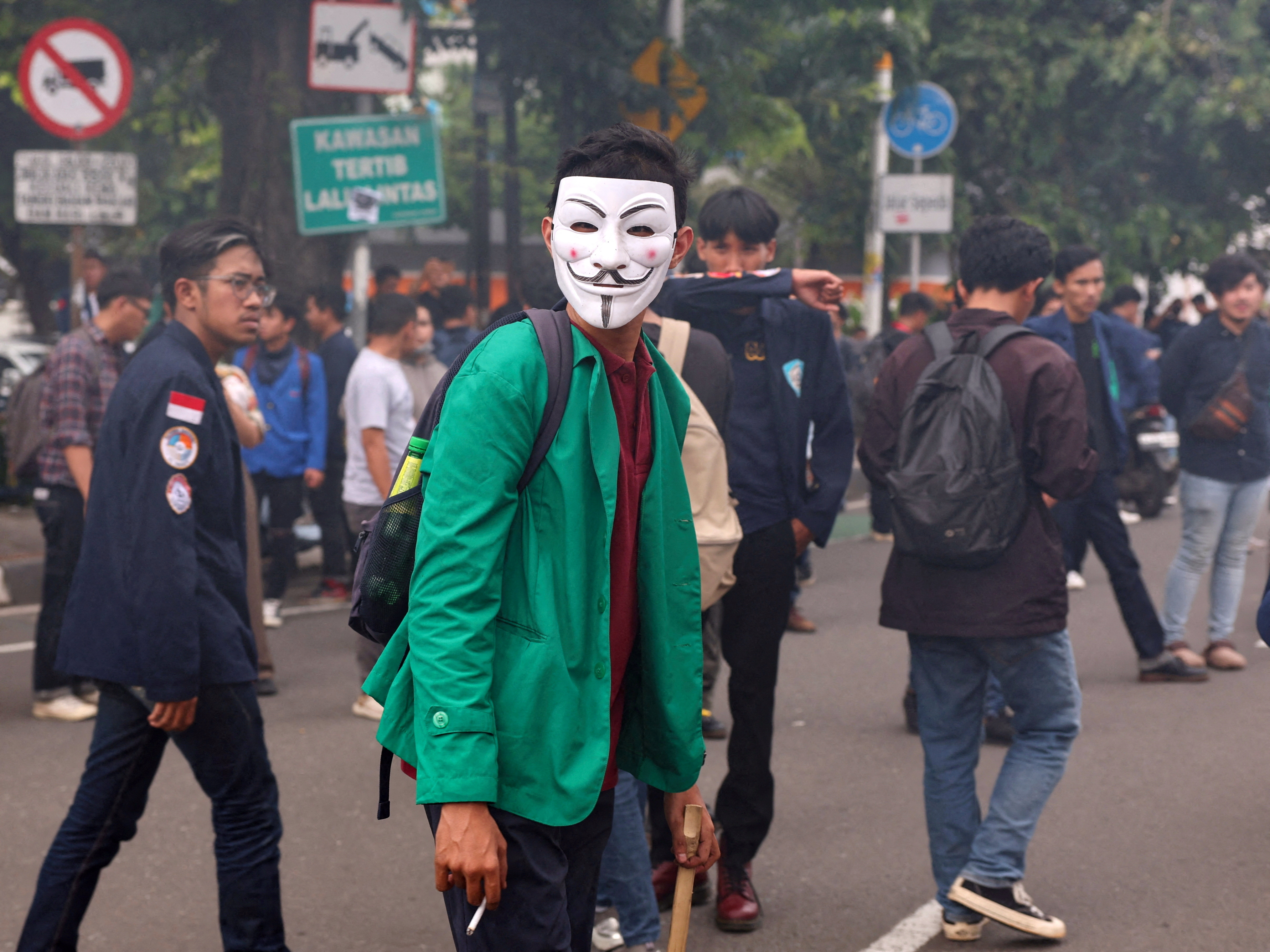 University students protest against Indonesia's outgoing President Widodo's perceived interference in the February 14th election, in Jakarta